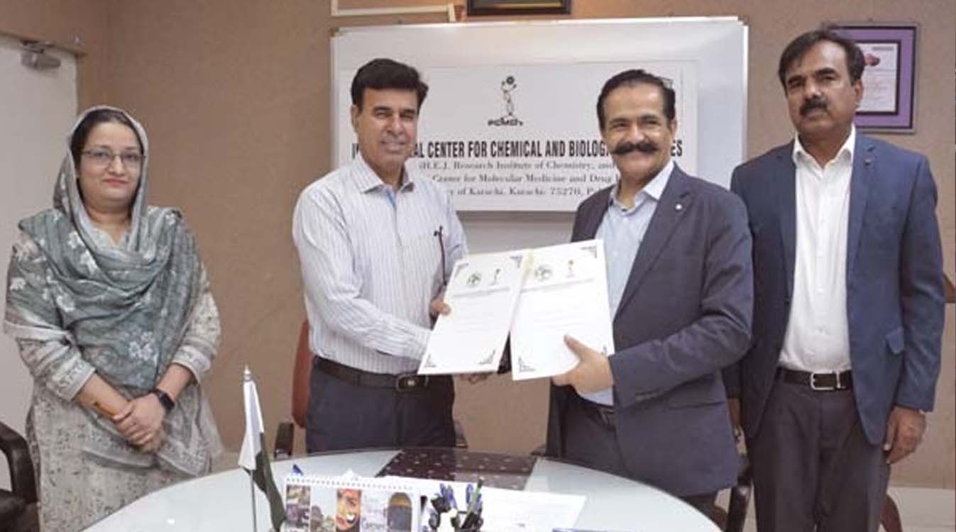 After signing the MoU, Prof. Dr. Muhammad Raza Shah, Director ICCBS, University of Karachi, and Prof. Dr. Muhammad Mazhar Ayaz, Vice Chancellor Cholistan University, exchange signed agreement during a ceremony held at ICCBS, University of Karachi.